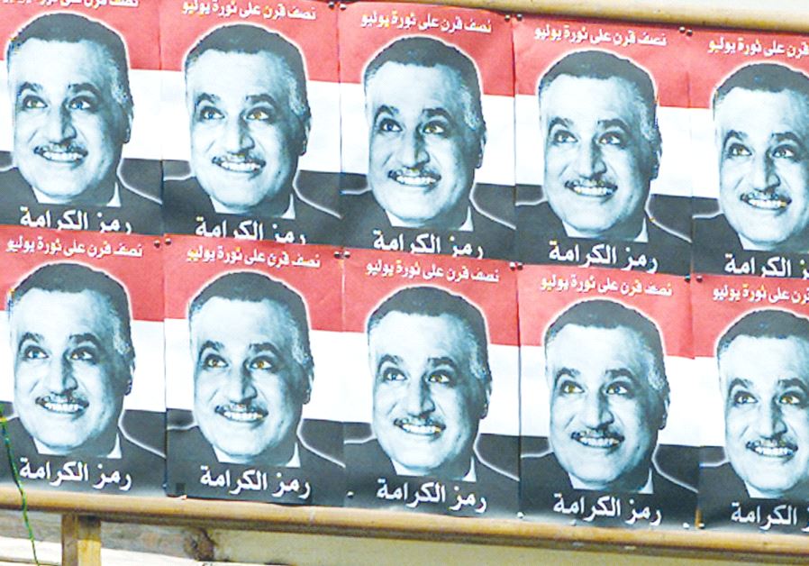 A BILLBOARD with images of former Egyptian president Gamal Abdel Nasser, who pressured Morocco to prevent immigration to Israel.