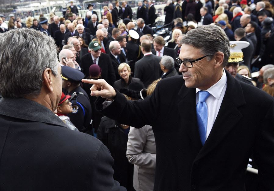US Energy Secretary nominee Rick Perry leaves after the Presidential Inauguration of Donald Trump on January 20, 2017, at the US Capitol in Washington, DC