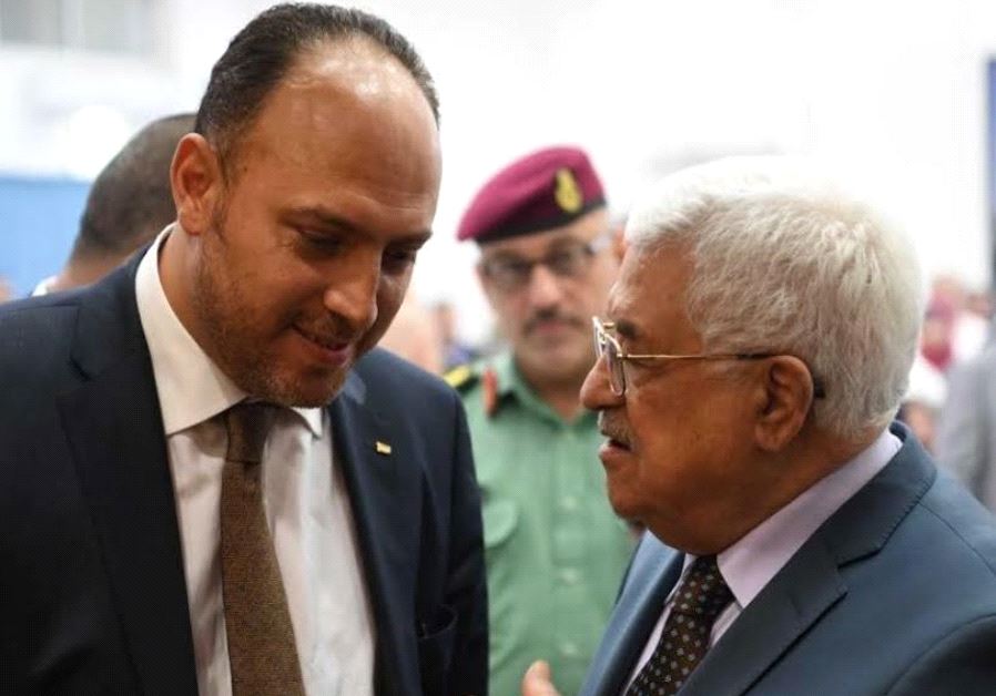 Husam Zomlot and Mahmoud Abbas.