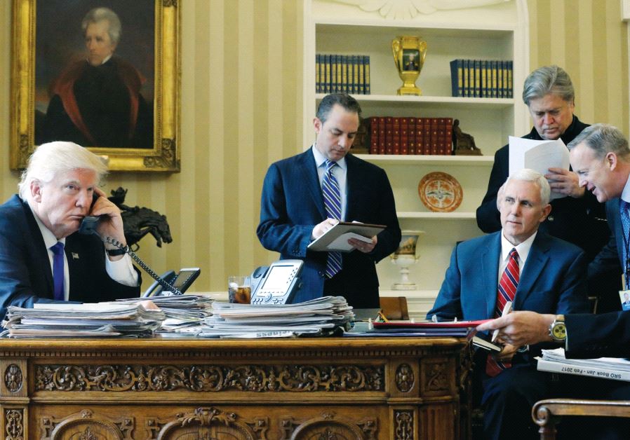 President Donald Trump, joined by (left to right) Chief of Staff Reince Priebus, Vice President Mike Pence, senior adviser Steve Bannon, Communications Director Sean Spicer and National Security Advisor Michael Flynn