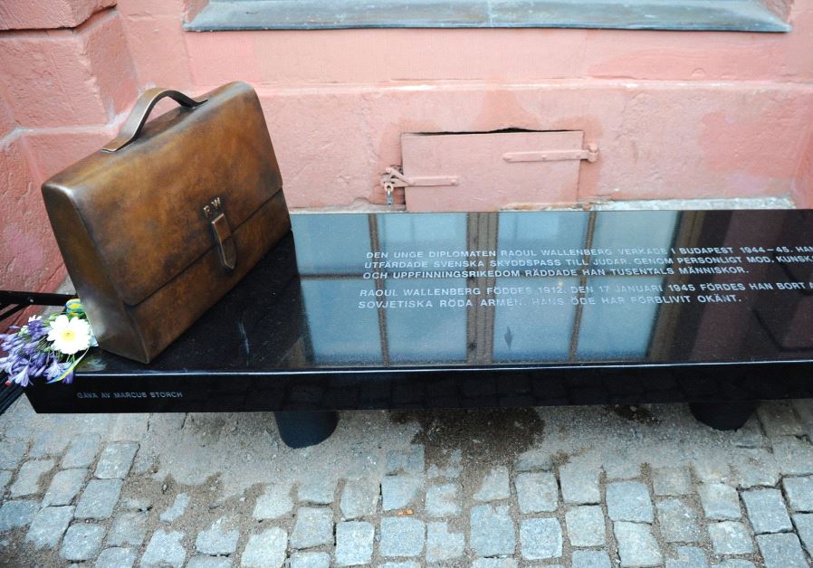 THE MEMORIAL BENCH commemorating Raoul Wallenberg is seen at its inauguration outside the Foreign Ministry in Stockholm in 2012, about two weeks after the centennial of his birth.