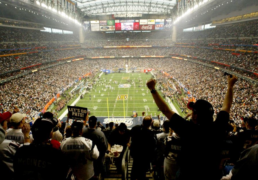 The field at Reliant Stadium is seen from overhead just before the start of Super Bowl XXXVIII, in Houston, Texas