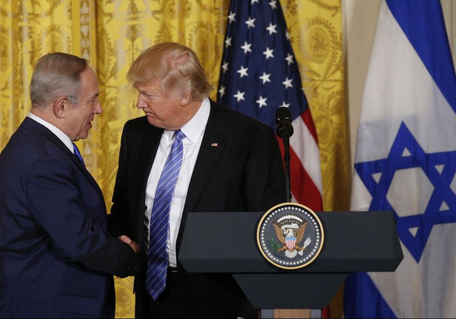 President Donald Trump (R) greets Israeli Prime Minister Benjamin Netanyahu at a joint news conference at the White House. 
