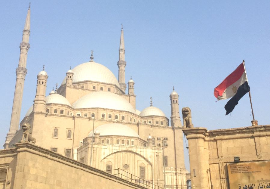 AN EGYPTIAN flag flutters in front of the Muhammad Ali mosque in Cairo.