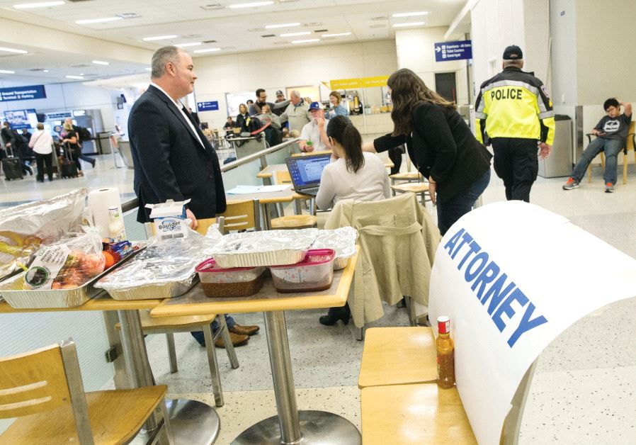 Attorneys volunteer their services at Dallas/Fort Worth International Airport, Texas, earlier this month