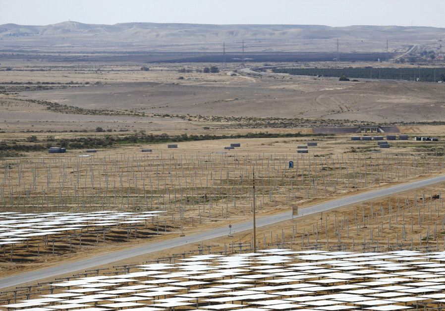 Heliostat mirrors are seen during the construction of a solar-power field in the Negev