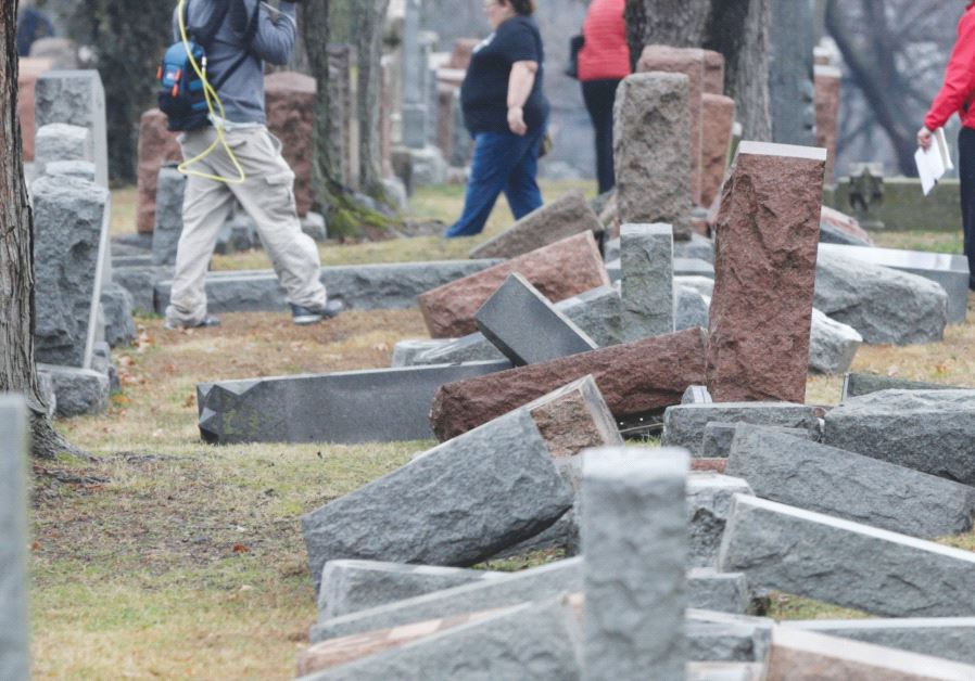 A ROW of more than 170 toppled Jewish headstones is seen after vandals attacked a Jewish cemetery near St. Louis, February 2017