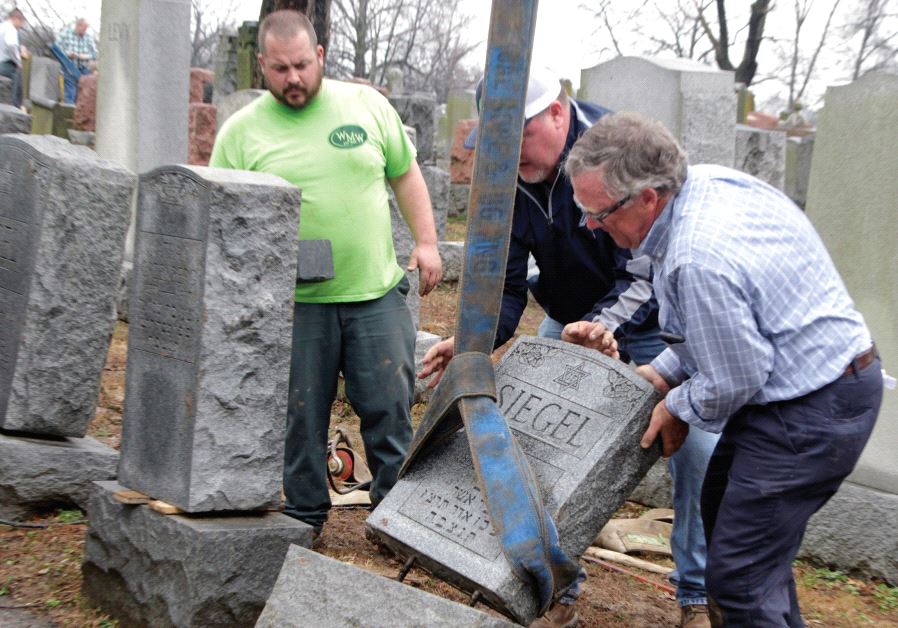 Toppled Jewish headstones after a weekend vandalism attack on Chesed Shel Emeth Cemetery in University City, a suburb of St Louis, Missouri