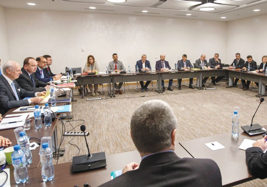 Special envoy of the UN Secretary-General for Syria Staffan de Mistura (left) and Syria’s High Negotiations Committee leader Nasr al-Hariri (right) attend a round of negotiations, during the Intra Syria talks, at the European headquarters of the UN in Geneva last Friday