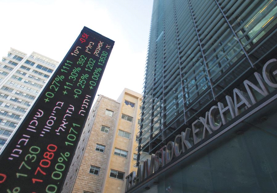 An electronic board displaying market data is seen at the entrance to the Tel Aviv Stock Exchange