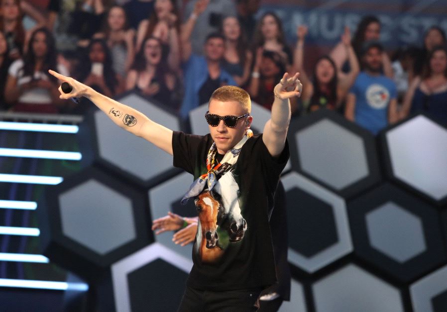 Macklemore performs during the iHeartRadio Much Music Video Awards (MMVAs) in Toronto, Ontario, Canada June 19, 2016. 