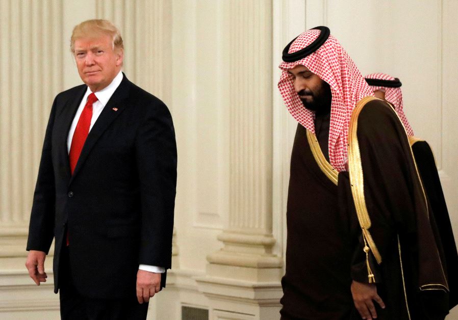 US President Donald Trump and Saudi Deputy Crown Prince and Minister of Defense Mohammed bin Salman enter the State Dining Room of the White House