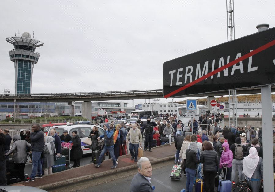 Passengers evacuated from Orly airport southern terminal after a shooting incident near Paris, France 