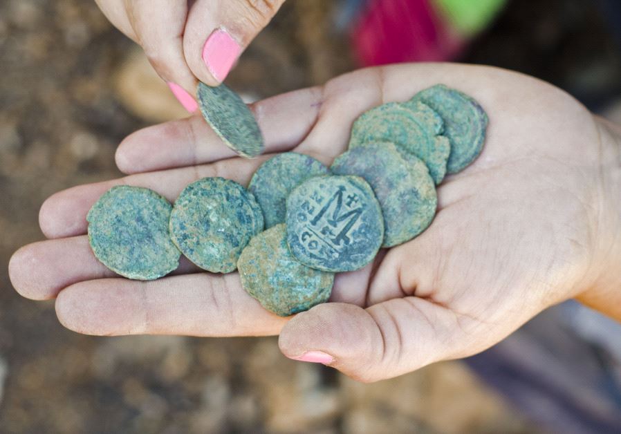 Rare 1,400-year-old bronze Byzantine-era coins found near Jerusalem’s Highway 1