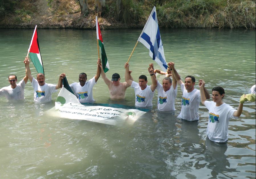 Israeli, Palestinian and Jordanian mayors and municipal representatives participate in an event in the lower Jordan River, to call on the two governments to rehabilitate the river