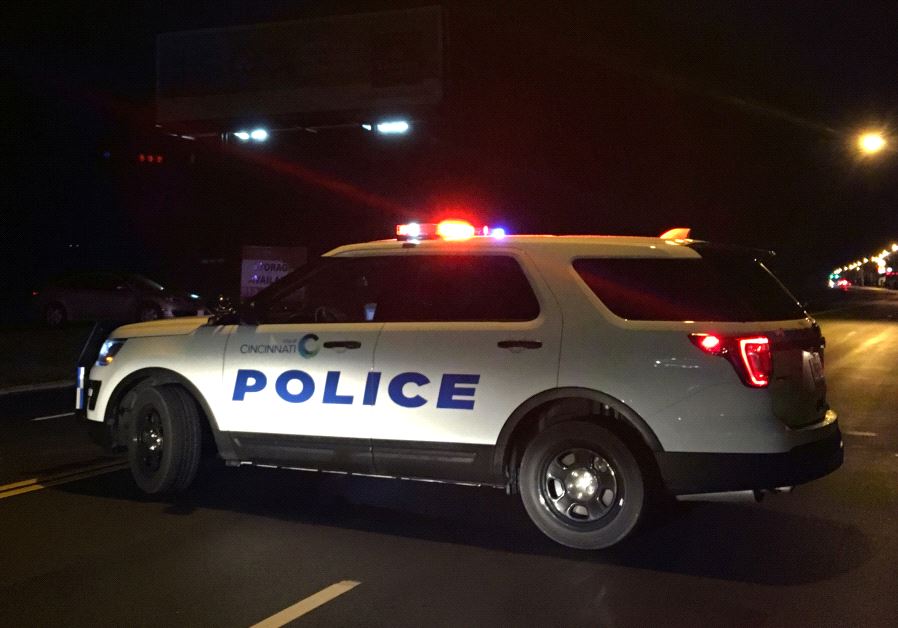 A police car blocks access to the scene of a mass shooting at the Cameo Nightlife club in Cincinatti, Ohio, US March 26, 2017.