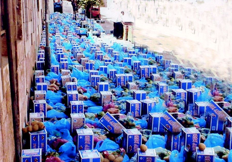 Passover food baskets distributed to Israelis in need