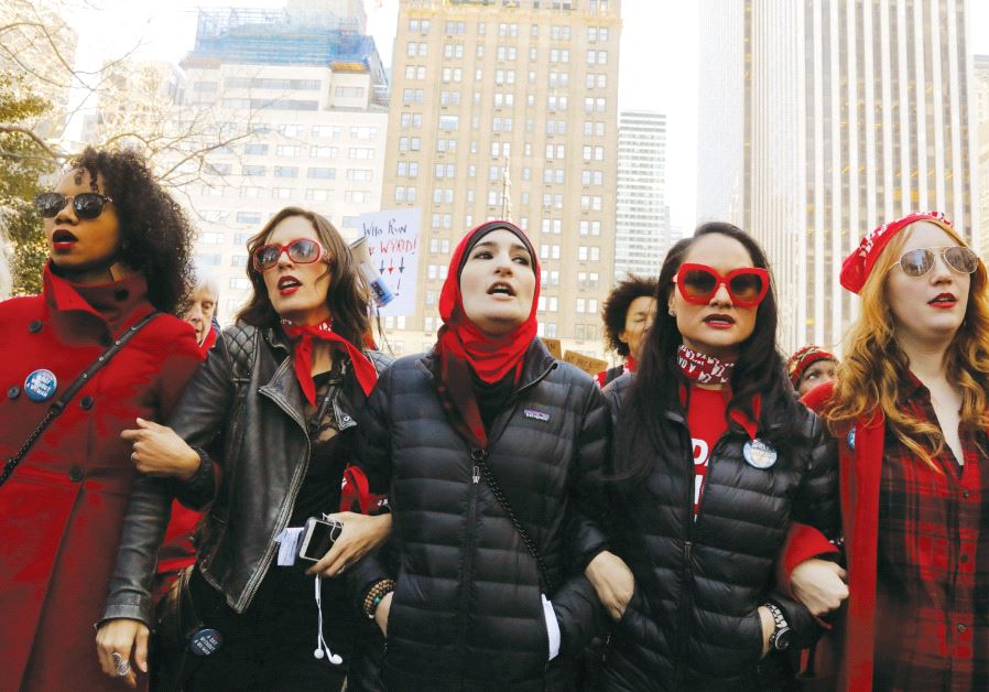 Linda Sarsour (center) leads during a ‘Day Without a Woman’ march on International Women’s Day in New York, earlier this month