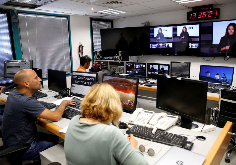 FILE PHOTO: Employees work in the offices of Kan, the new Israeli Public Broadcasting Corporation, in Tel Aviv, Israel November 3, 2016.