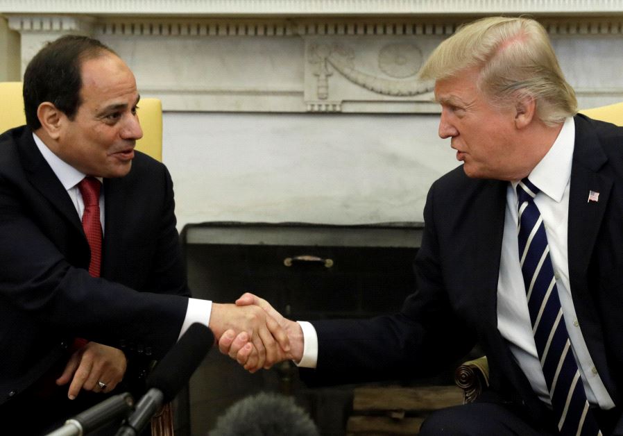 US President Donald Trump shakes hands with Egyptian President Abdel Fattah al-Sisi in the Oval Office of the White House in Washington, US, April 3, 2017.