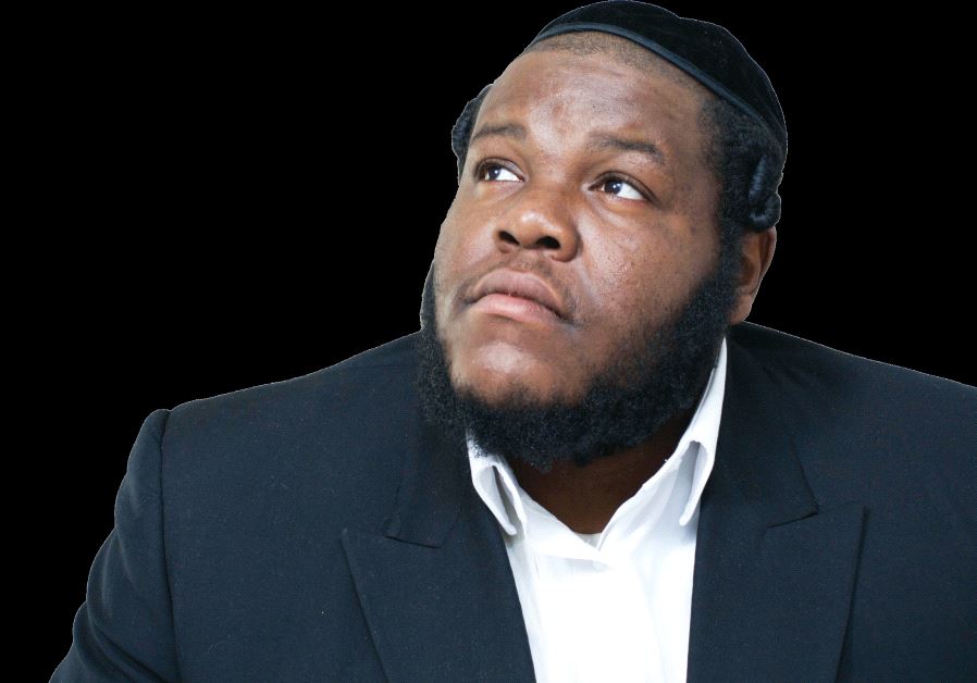 Rapper Nissim Black performs in a concert