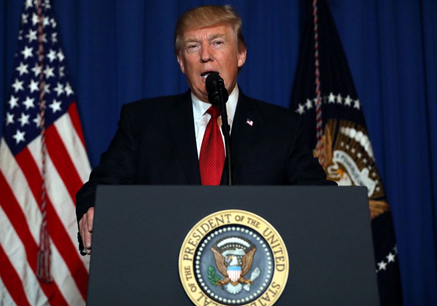 US President Donald Trump delivers an statement about missile strikes on a Syrian airbase, at his Mar-a-Lago estate in West Palm Beach, Florida, US, April 6, 2017. 