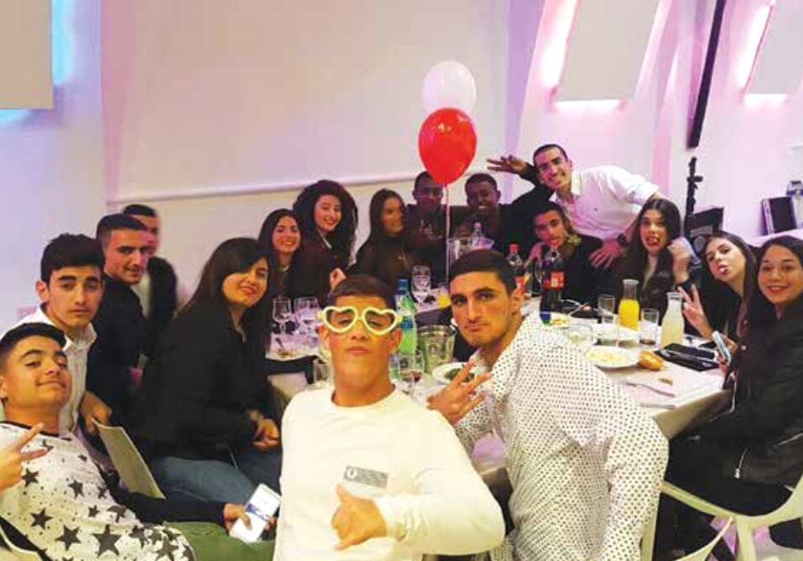 Ma’agalim volunteers pose at a bar mitzvah they organized in February as part of the organization’s Social Action and Leadership Program for 11th grade students