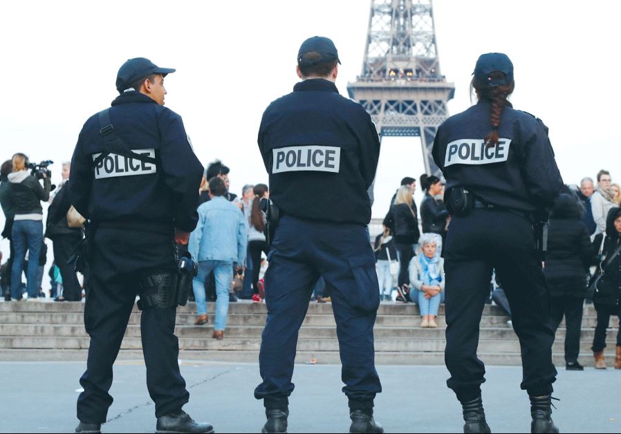 POLICE PATROL the Trocadero area, across the Seine River from the Eiffel Tower, in Paris