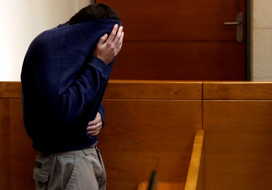 An US-Israeli teen who was arrested in Israel on suspicion of making bomb threats against Jewish community centers in the United States, Australia and New Zealand is seen at a remand hearing at Magistrate's Court in Rishon Lezion, Israel on March 23, 2017