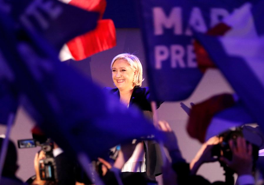 Marine Le Pen, French National Front (FN) political party leader and candidate for French 2017 presidential election, celebrates after early results in the first round of 2017 French presidential election, in Henin-Beaumont, France