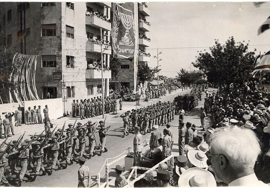 A military parade takes to the streets on Independence Day, 1950