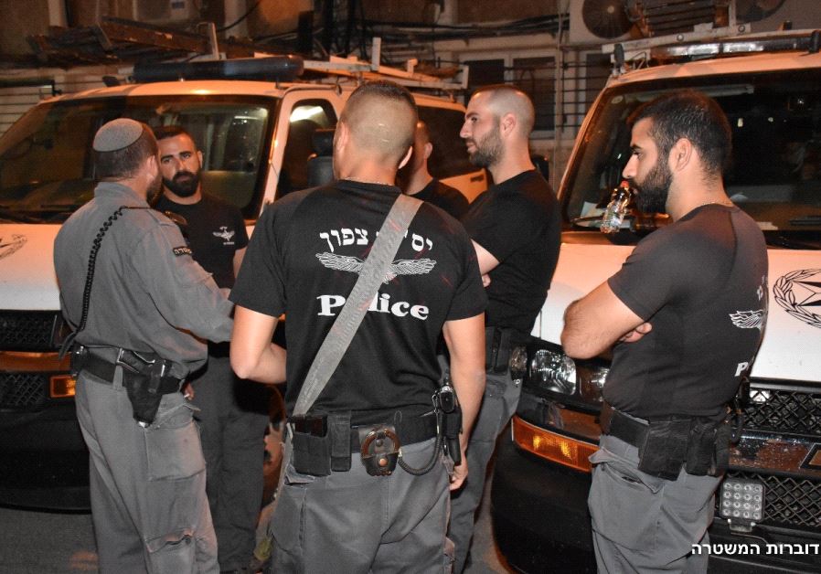 Police capture weapons and drugs in raid in northern Israel.