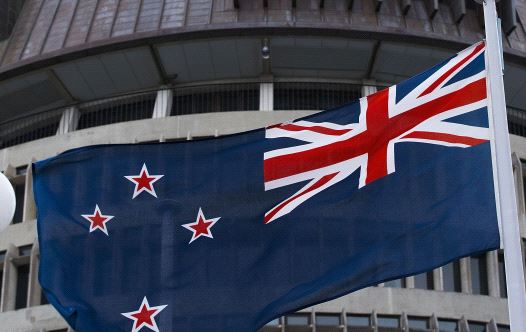 The current New Zealand flag flies on Parliament buildings in Wellington's Central Cusiness District on March 24, 2016.
