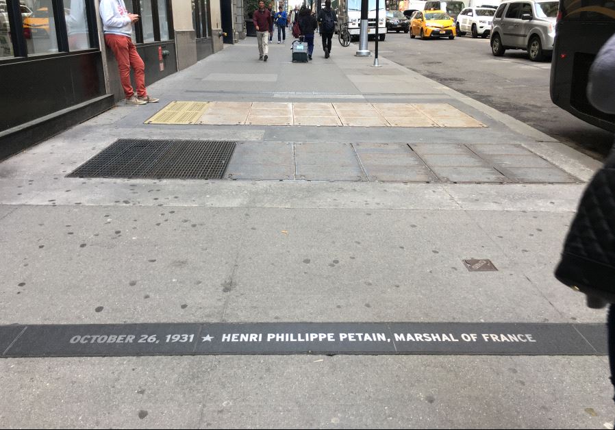 The name French Nazi collaborator Henri Philippe Pétain is engraved in New York City's "Canyon of Heroes" on Broadway, alongside those of historical figures such as Churchill, De Gaulle and Ben Gurion