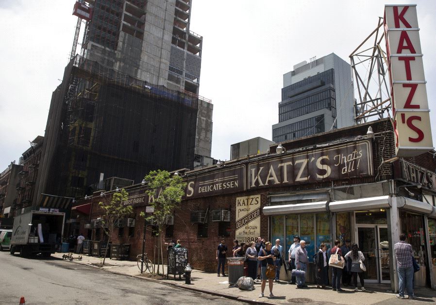 People stand in line at Katz's Delicatessen, the famous deli founded in 1888, in New York's lower East Side