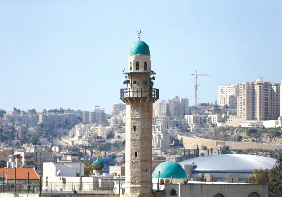 THE MINARET of a mosque is seen in the Arab neighborhood of Beit Safafa in Jerusalem
