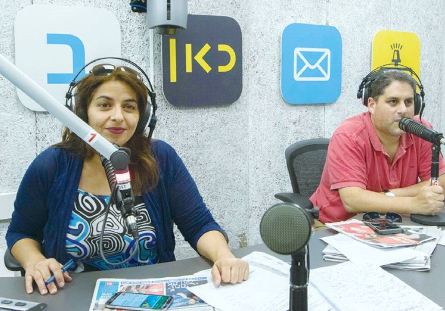IBC STAFF are shown yesterday at their temporary studio in Modi’in preparing for today’s scheduled launch