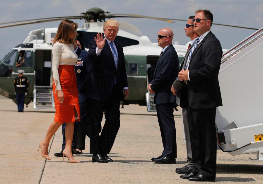 US President Donald Trump and first lady Melania Trump board Air Force One May 19, 2017. 