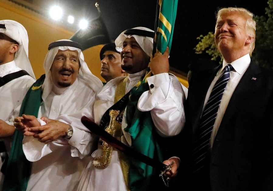 US President Donald Trump pictured dancing with swords at a reception ceremony held in his honor in Saudi Arabia on May 20, 2017. 