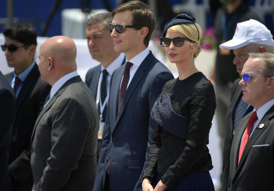 White House senior advisor Jared Kushner (C) and Ivanka Trump (2R), the daughter of US President take part in a welcome ceremony upon the US President's arrival at Ben Gurion International Airport in Tel Aviv on May 22, 2017, as part of his first trip overseas