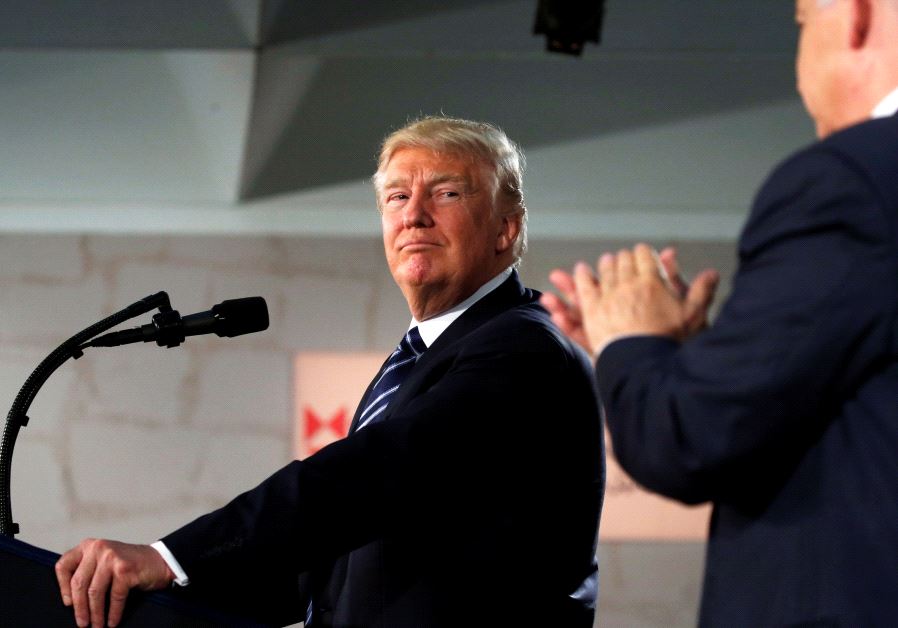 U.S. President Donald Trump looks towards Israeli Prime Minister Benjamin Netanyahu while delivering an address at the Israel Museum in Jerusalem May 23, 2017. 