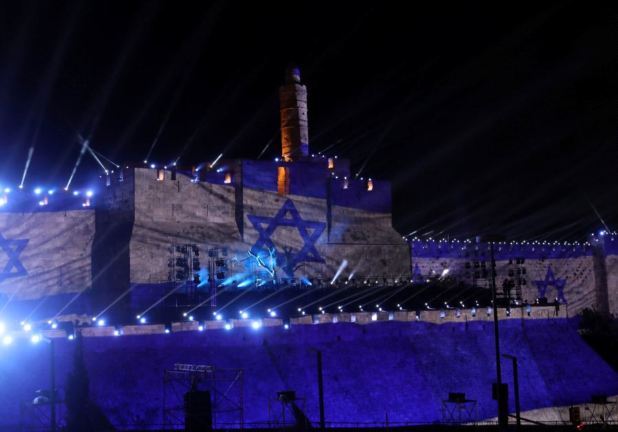 Israel's national flag is projected on the wall near the Tower of David in the Old City of Jerusalem May 20, 2017