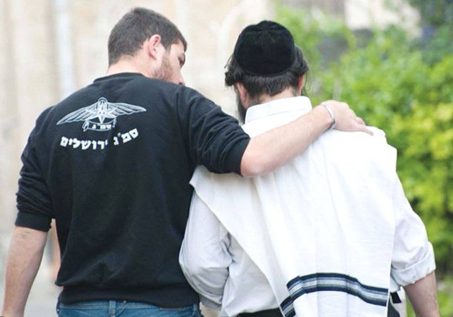 A secular and religious Jew walk arm in arm as a celebration of Jewish unity