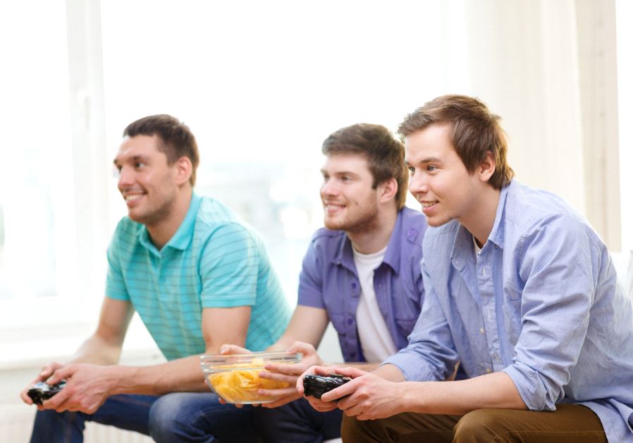Young Americans playing video games (illlustrative)