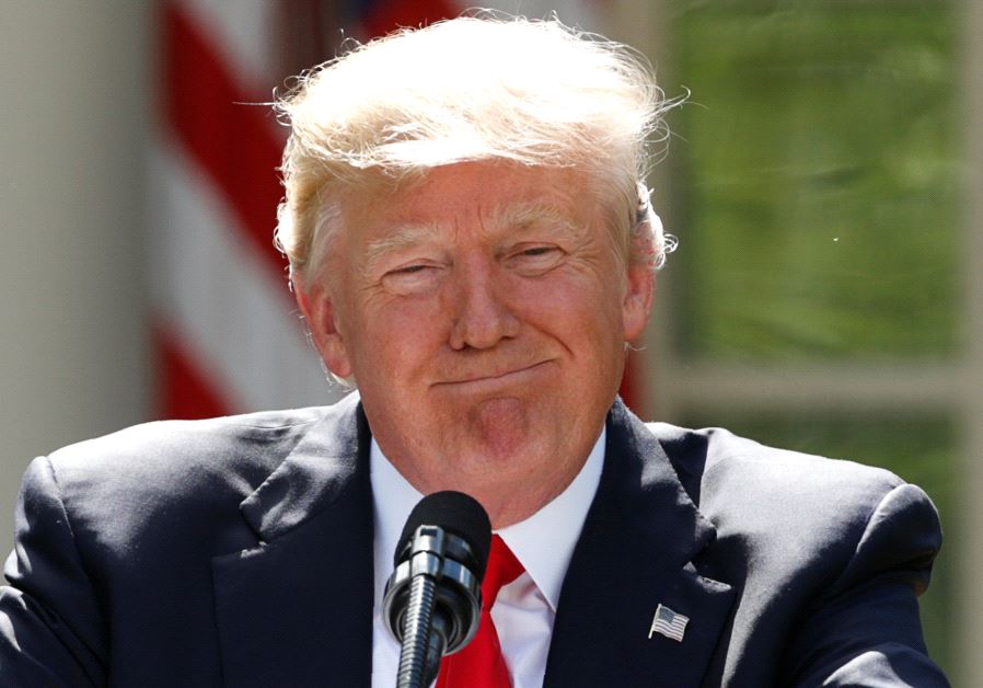 US President Donald Trump pauses as he announces his decision that the United States will withdraw from the landmark Paris Climate Agreement, in the Rose Garden of the White House in Washington, US, June 1, 2017.