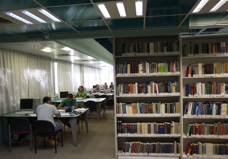 Students sit in a library at the Ariel University Center in the West Bank settlement of Ariel