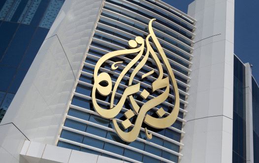 The logo of Al Jazeera Media Network is seen on its headquarters building in Doha, Qatar June 8, 2017.