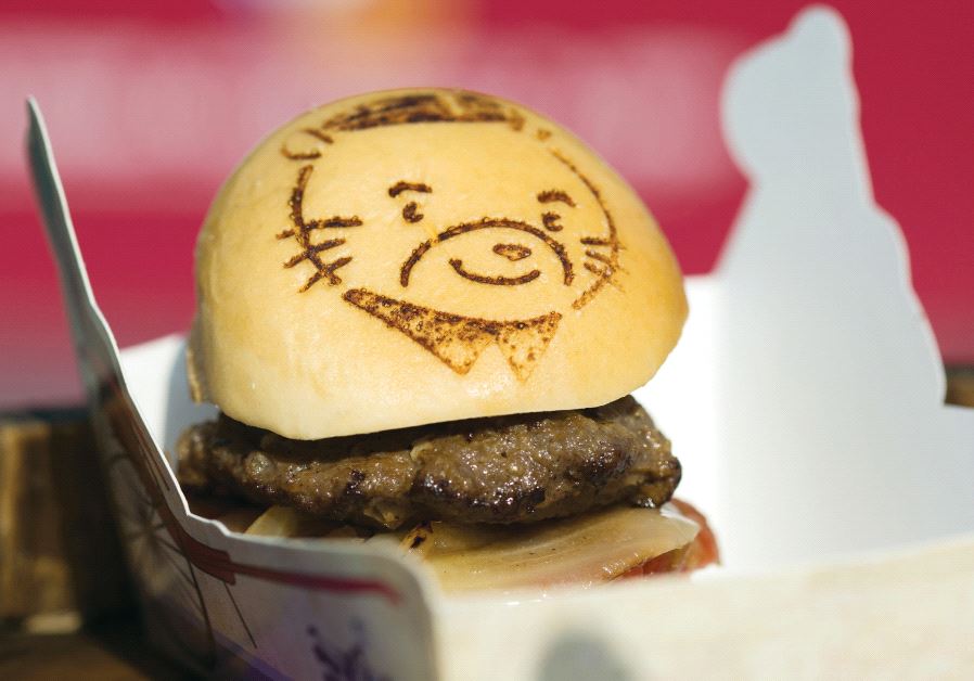 A man-made meat burger (illustrative)