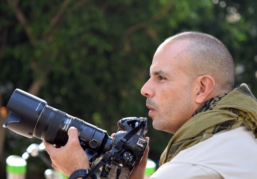 million eyez chief photographer Essdras M Saurez and his camera