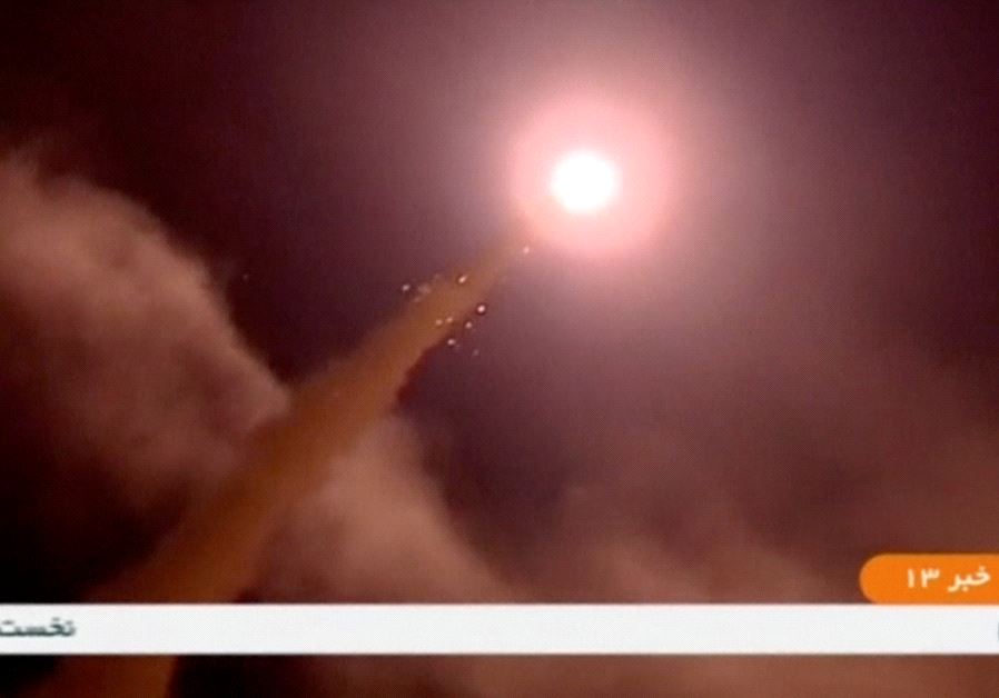 A still image taken from footage shot on June 18, 2017 and broadcast on Iranian Television IRINN, purports to show missiles being fired from Iran into eastern Syria.